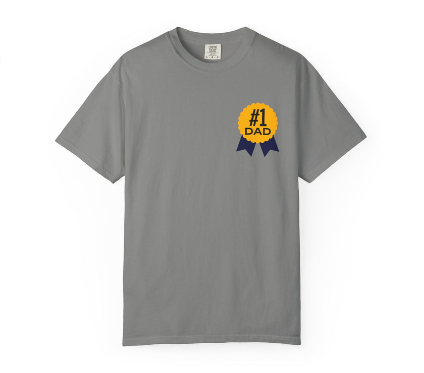Gray t-shirt featuring a yellow and navy blue award ribbon graphic on the chest with the text "#1 Dad," designed as a fun and heartfelt Father's Day gift.