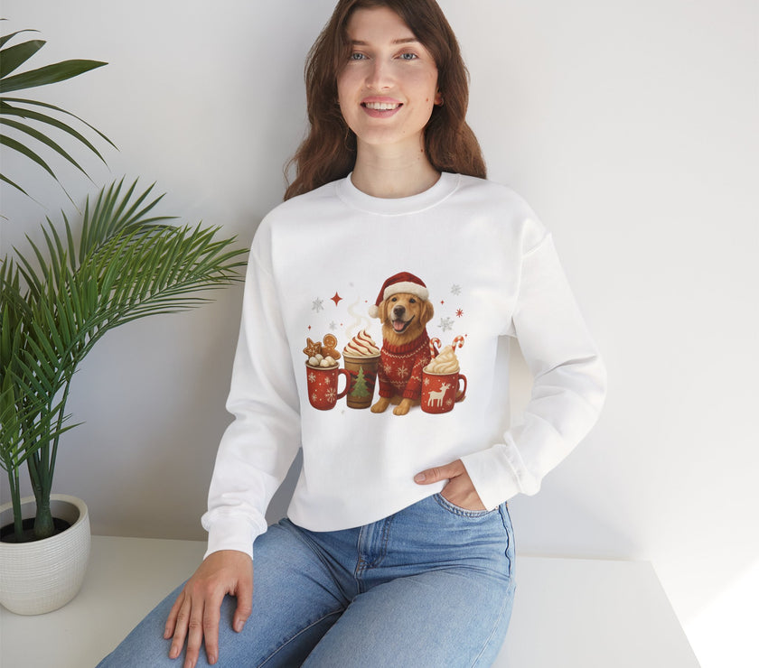 Woman wearing a white sweatshirt with a dog and hot chocolate design, sitting on a white surface with a plant in the background.