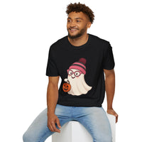 Man wearing a black t-shirt with a ghost design sitting on a white stool against a white background
