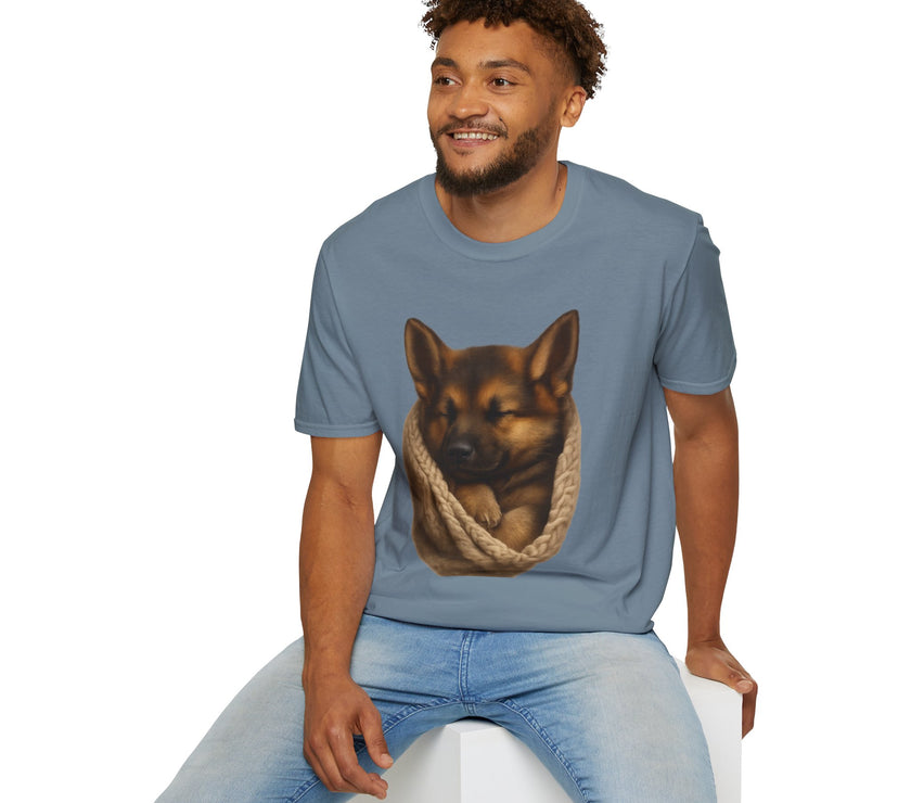 Man wearing a blue t-shirt with a dog graphic on a white background