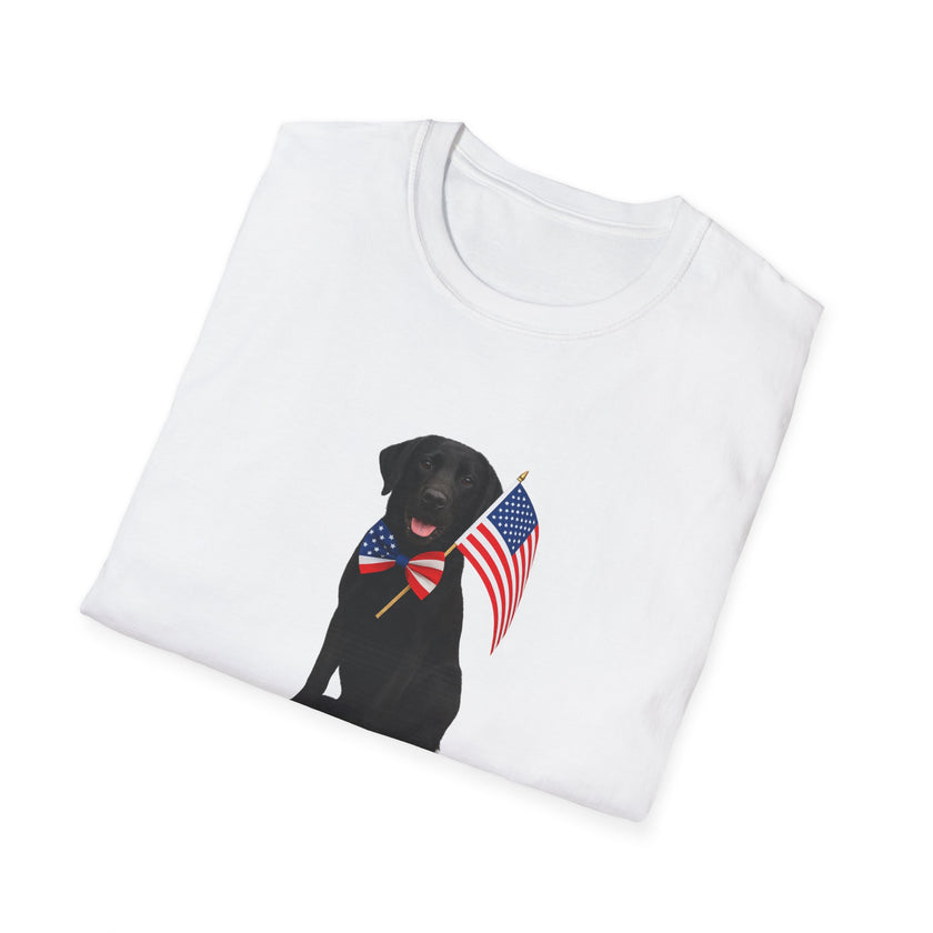 White t-shirt featuring a patriotic Black Lab wearing an American flag bowtie and holding U.S. flags, with the Black Labphrase "Born to Be Free" printed below — perfect for dog lovers and patriotic Americans.