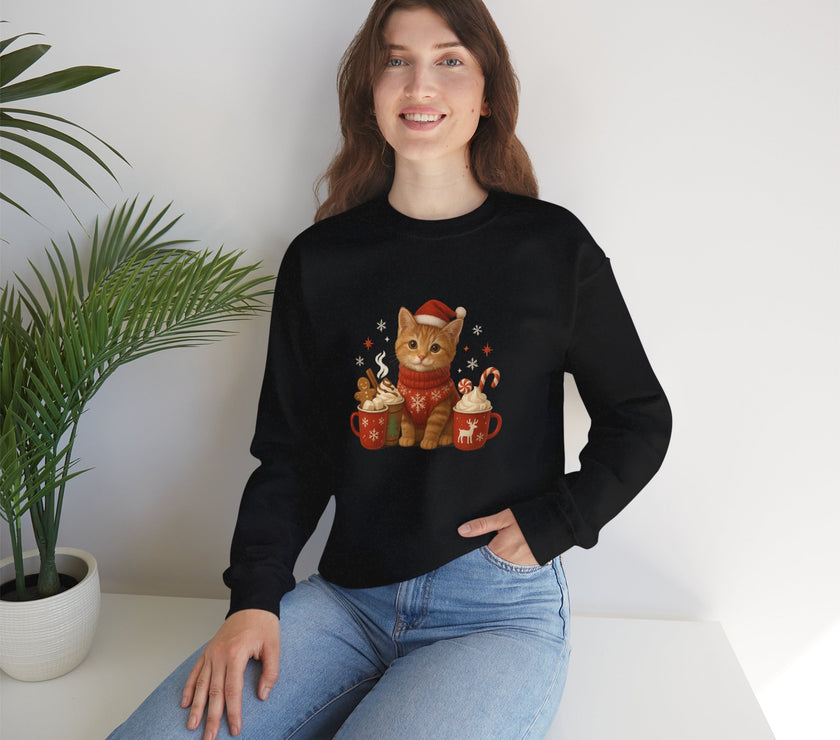 Woman wearing a black sweatshirt with a cat design sitting on a white surface.