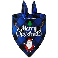 Blue checkered dog bandana with Santa Claus and Christmas tree design on a white background