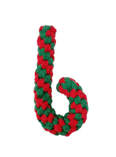 Red and green braided dog toy on a white background