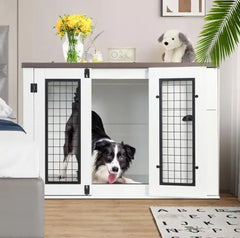 White pet crate with black grid doors in a room with a dog inside, a plant, and decorative items.