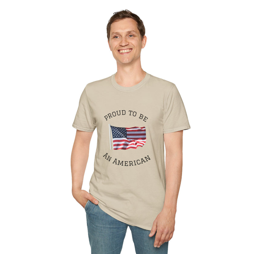Young man  wearing a white t-shirt with an American flag graphic and the words 'Proud to Be an American' printed around the flag