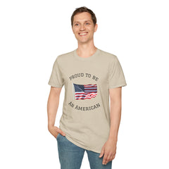 Young man  wearing a white t-shirt with an American flag graphic and the words 'Proud to Be an American' printed around the flag