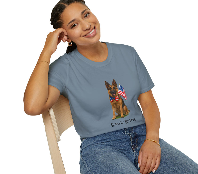 Stone Blue t-shirt featuring a patriotic German Shepherd wearing an American flag bowtie and holding U.S. flags, with the phrase "Born to Be Free" printed below — perfect for dog lovers and patriotic Americans.