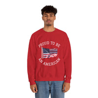 Person wearing a red sweatshirt with 'Proud to be an American' text and flag design on a white background