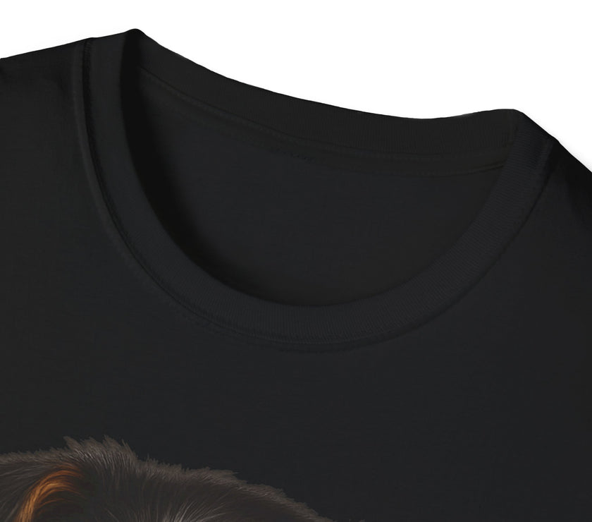 Close-up of a black t-shirt collar with a dog's head peeking out from underneath.