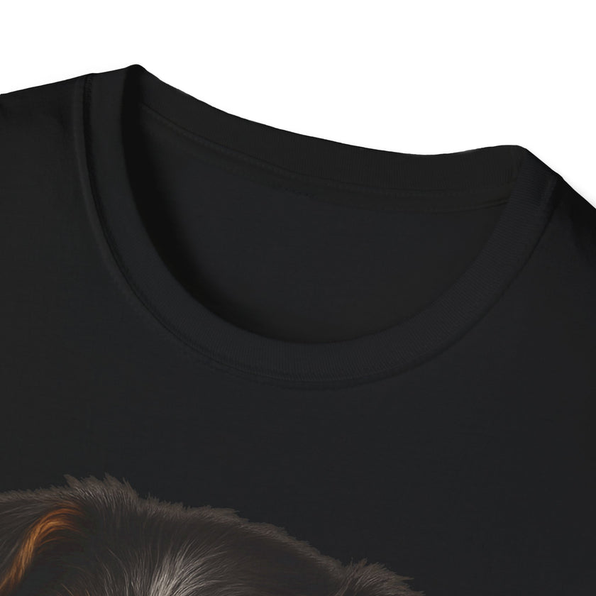 Close-up of a black t-shirt collar with a dog's head peeking out from underneath.