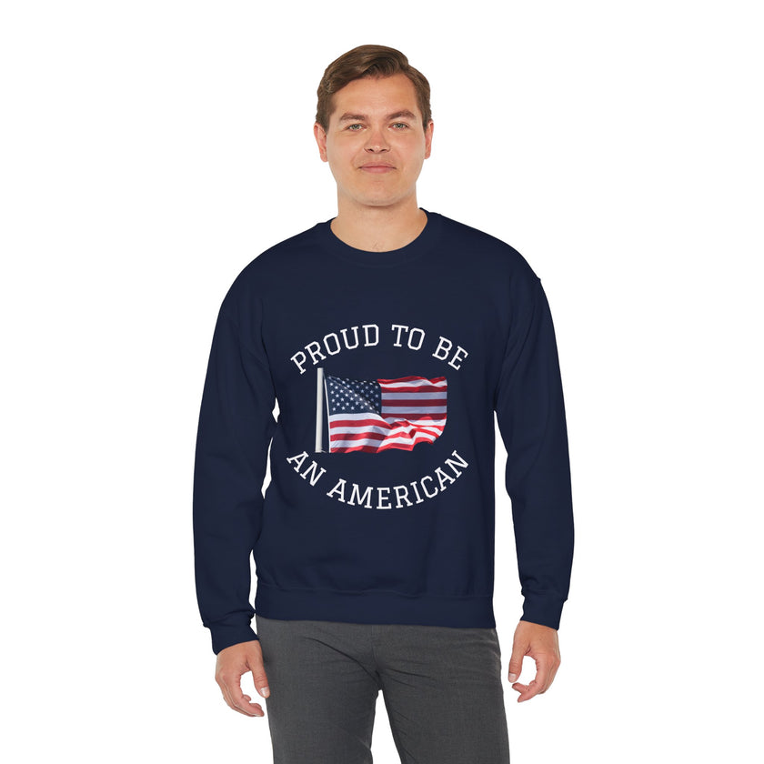 Man wearing a navy sweatshirt with 'Proud to be an American' text and flag design on a white background