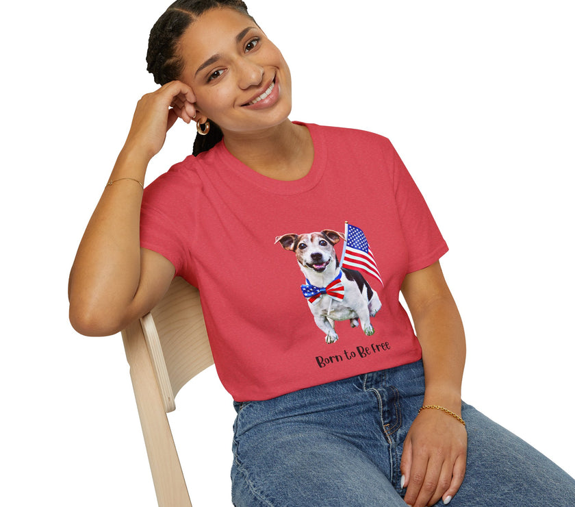 Female wearing T-shirt featuring a cute  puppy wearing an American flag bow tie and holding a small U.S. flag, with the phrase 'Born to Be Free' printed below the image.