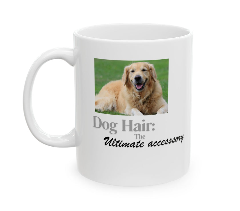 White ceramic mug featuring a photo of a smiling golden retriever lying on grass, with the humorous quote "Dog Hair: The Ultimate Accessory" printed below the image.