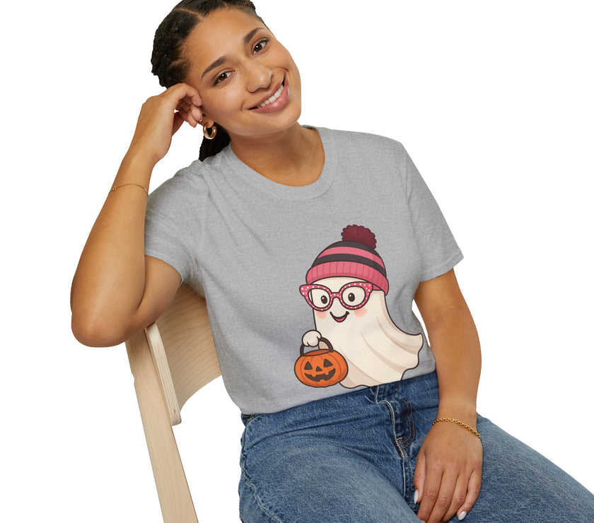 Person wearing a gray t-shirt with a cartoon character design, sitting on a chair.