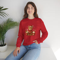 Person wearing a red sweater with a cat design, sitting on a white surface with a plant in the background.