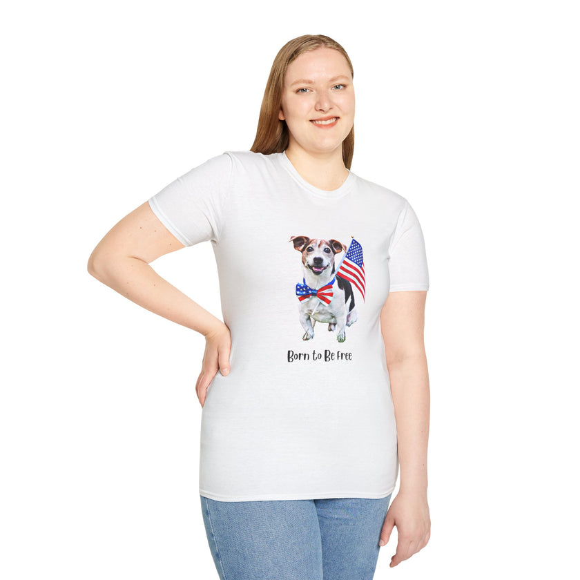 Female wearing T-shirt featuring a cute  puppy wearing an American flag bow tie and holding a small U.S. flag, with the phrase 'Born to Be Free' printed below the image.