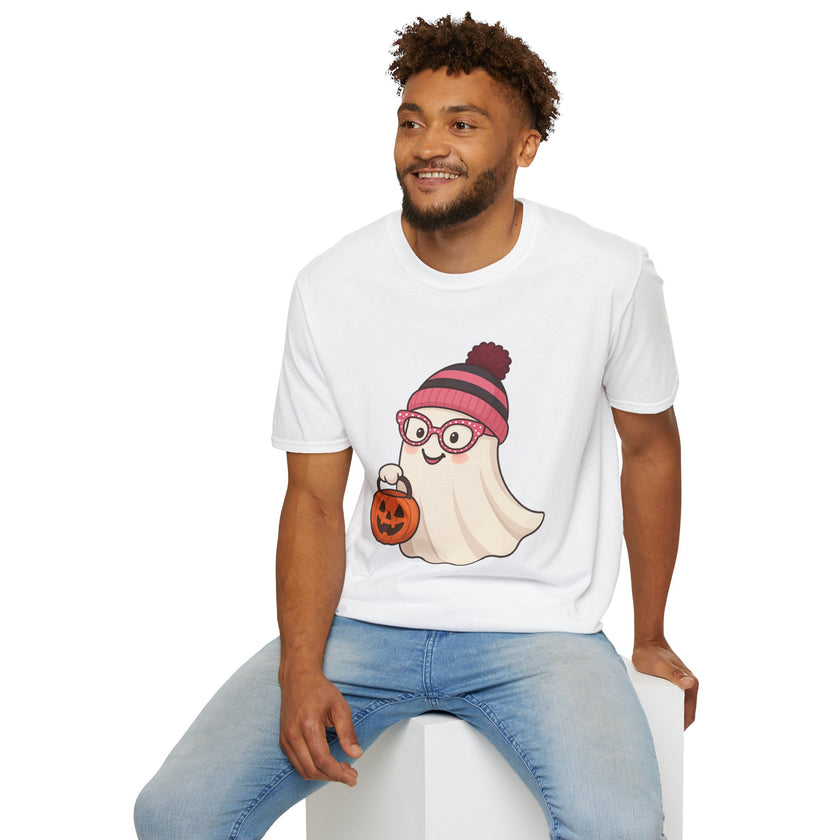 Man wearing a white t-shirt with a ghost graphic design sitting on a white stool.
