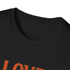 Black t-shirt with orange text on a white background