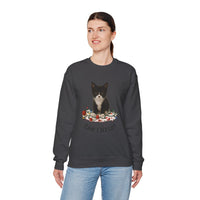 Person wearing a dark gray sweatshirt with a cat graphic and text on a white background