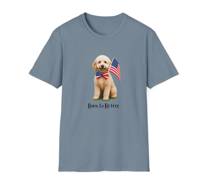 T-shirt featuring a cute golden doodle puppy wearing an American flag bow tie and holding a small U.S. flag, with the phrase 'Born to Be Free' printed below the image.