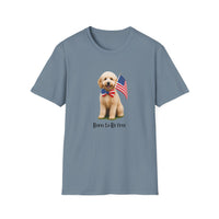 T-shirt featuring a cute golden doodle puppy wearing an American flag bow tie and holding a small U.S. flag, with the phrase 'Born to Be Free' printed below the image.