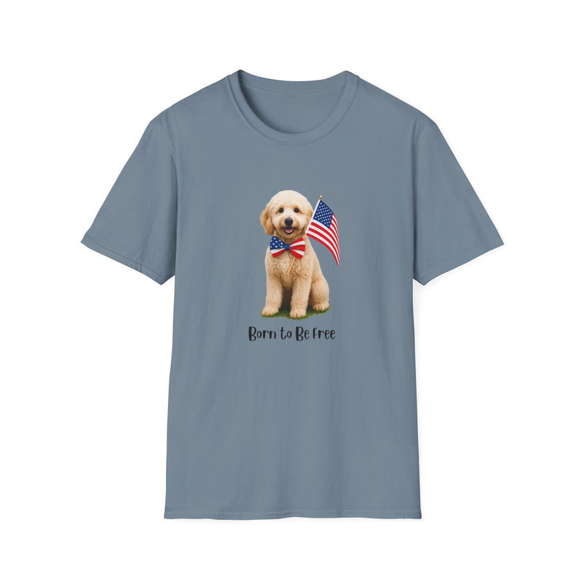 T-shirt featuring a cute golden doodle puppy wearing an American flag bow tie and holding a small U.S. flag, with the phrase 'Born to Be Free' printed below the image.