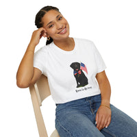 White t-shirt featuring a patriotic Black Lab wearing an American flag bowtie and holding U.S. flags, with the Black Labphrase "Born to Be Free" printed below — perfect for dog lovers and patriotic Americans.