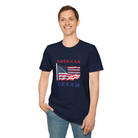 Male wearing T-shirt featuring an American flag graphic with the words 'AMERICAN DREAM' in red and blue text above and below the flag