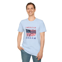Male wearing T-shirt featuring an American flag graphic with the words 'AMERICAN DREAM' in red and blue text above and below the flag