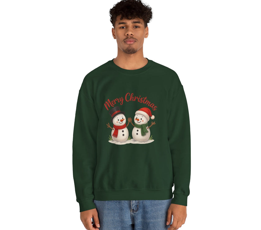 Person wearing a green Christmas-themed sweatshirt with snowmen and 'Merry Christmas' text.