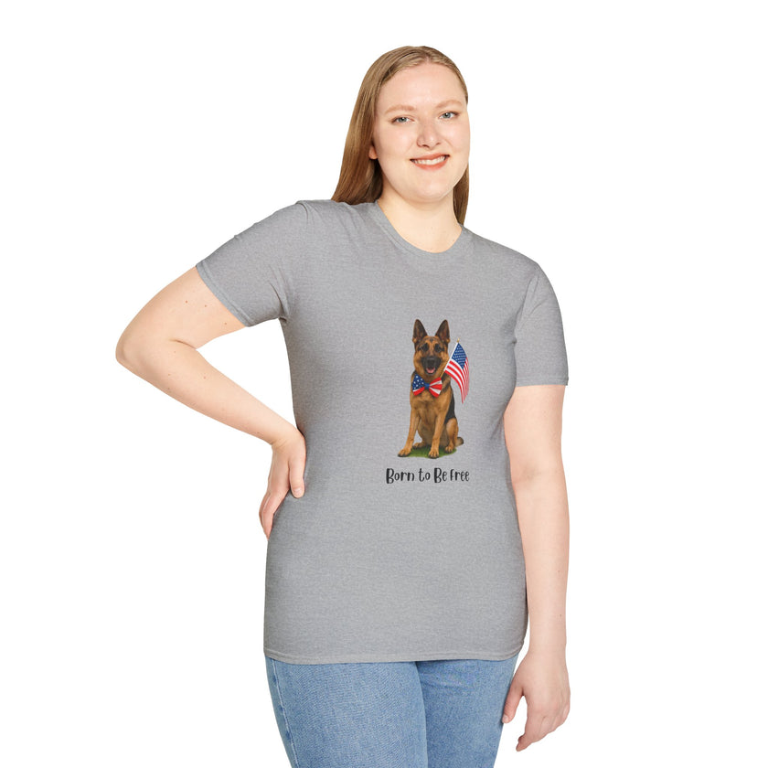 Sport Grey t-shirt featuring a patriotic German Shepherd wearing an American flag bowtie and holding U.S. flags, with the phrase "Born to Be Free" printed below — perfect for dog lovers and patriotic Americans.