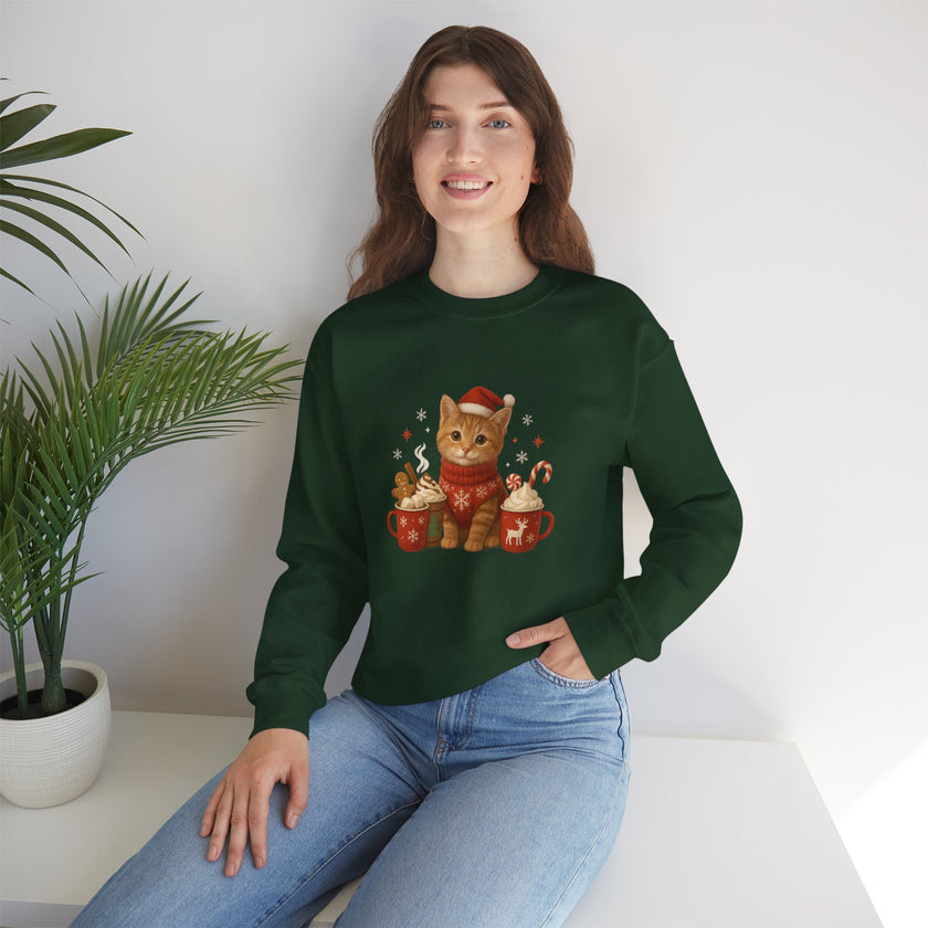 Woman wearing a green sweatshirt with a cat design sitting on a white surface.