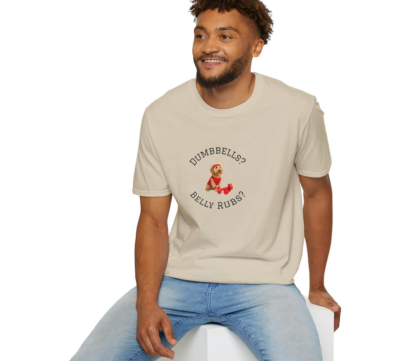 Man wearing a beige t-shirt with a graphic design sitting on a white stool against a white background