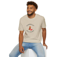 Man wearing a beige t-shirt with a graphic design sitting on a white stool against a white background