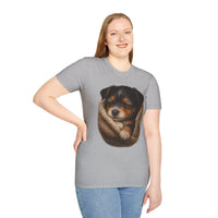 Person wearing a gray t-shirt with a dog graphic on a white background