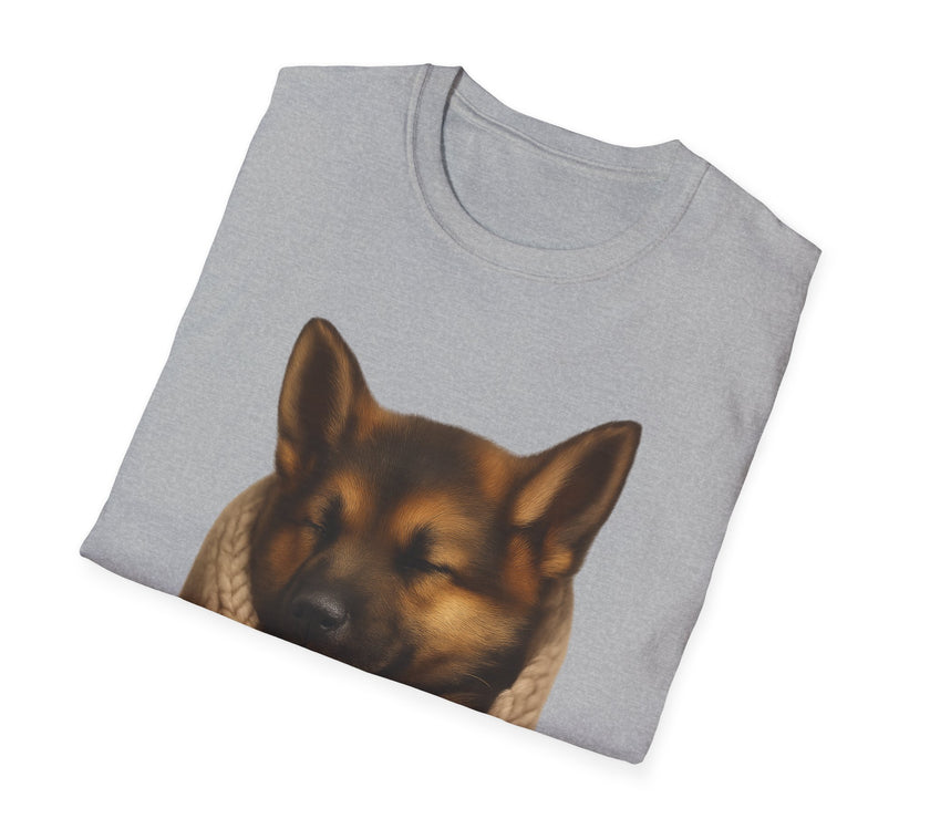 Folded gray t-shirt with a dog's face printed on it against a white background
