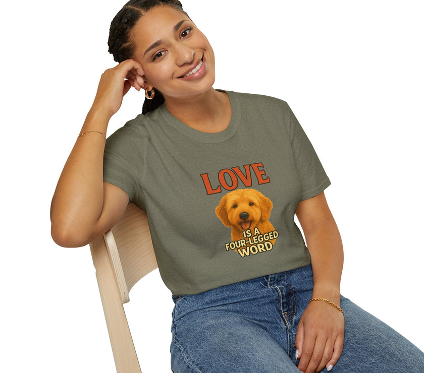 Woman wearing a green t-shirt with a dog graphic and text, sitting on a chair.