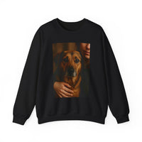 Black sweatshirt with a graphic of a person holding a dog on a white background