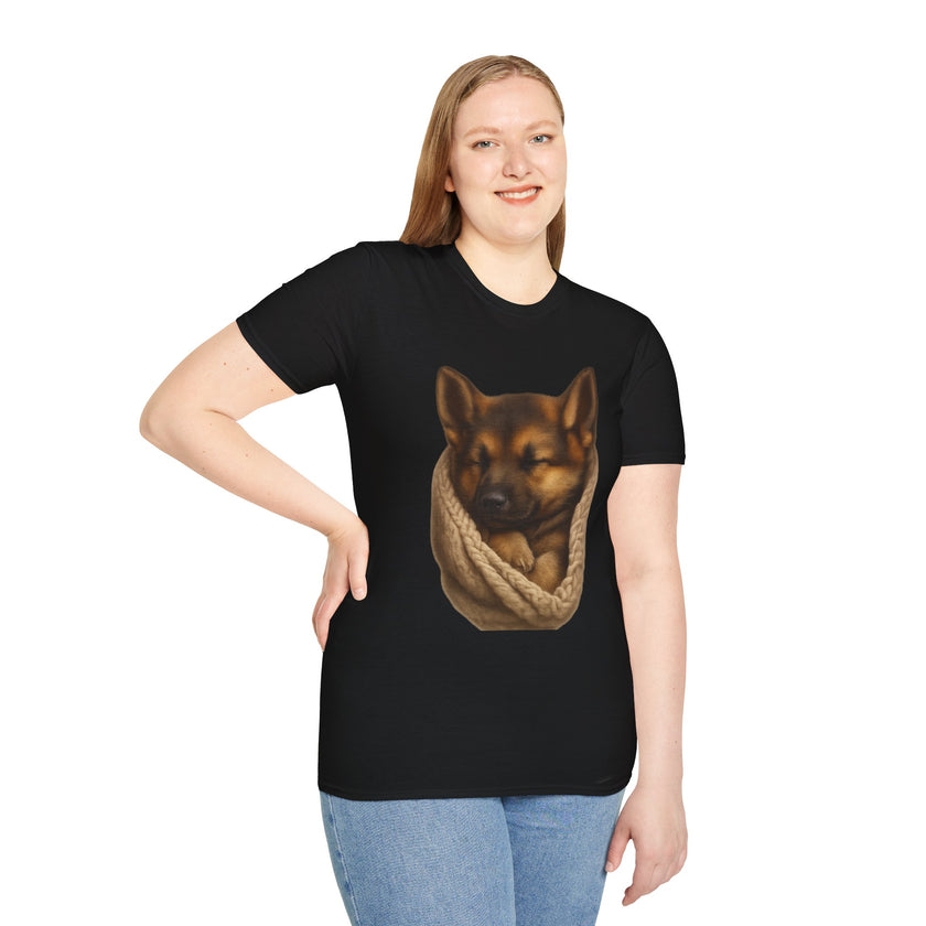 Person wearing a black t-shirt with a graphic of a dog in a sling on a white background