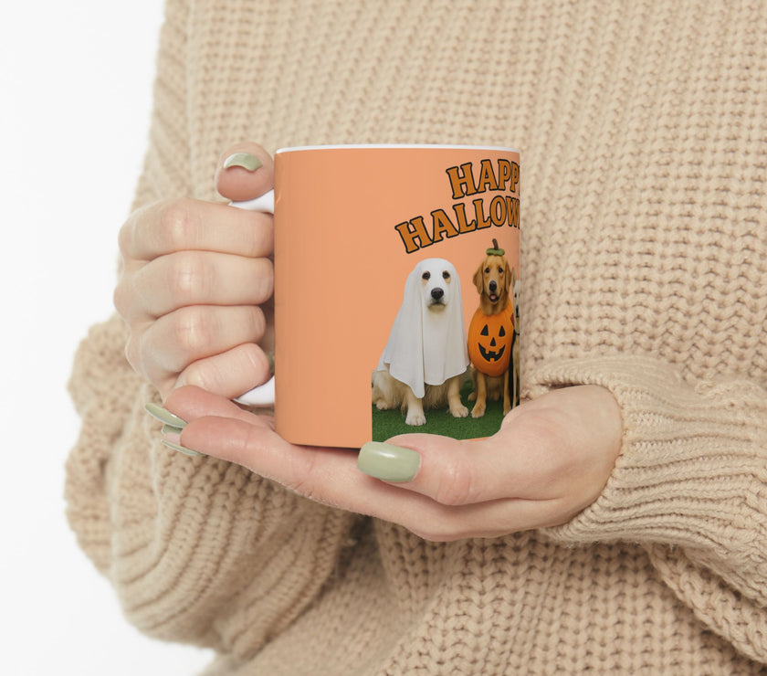 Person holding a mug with Halloween design featuring two dogs in costumes on a white background
