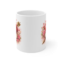 White mug with floral design on a white background