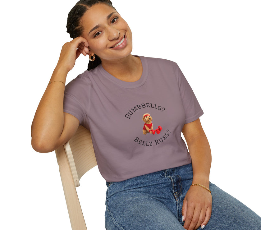 Person wearing a purple t-shirt with a graphic and text, sitting on a chair.