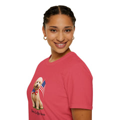 Female wearing T-shirt featuring a cute golden doodle puppy wearing an American flag bow tie and holding a small U.S. flag, with the phrase 'Born to Be Free' printed below the image.