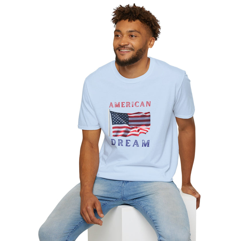 Male wearing T-shirt featuring an American flag graphic with the words 'AMERICAN DREAM' in red and blue text above and below the flag