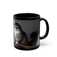 Black ceramic mug featuring a cartoon-style image of a cat sitting at a computer with the funny quote “I work hard so my cat can have a better life.”