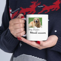 White ceramic mug featuring a photo of a smiling golden retriever lying on grass, with the humorous quote "Dog Hair: The Ultimate Accessory" printed below the image.
