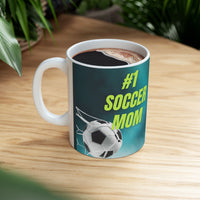 Mug with '#1 Soccer Mom' text and soccer ball design on a teal background