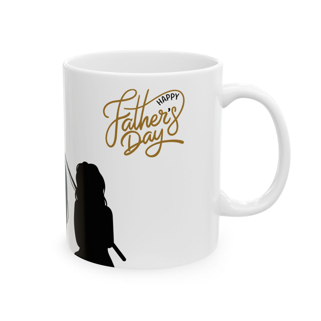 White ceramic mug featuring a silhouette of a child holding a fishing rod next to an adult figure, with the words "Happy Father's Day" in gold script above—an ideal gift for dads who love fishing and family time.
