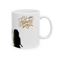 White ceramic mug featuring a silhouette of a child holding a fishing rod next to an adult figure, with the words "Happy Father's Day" in gold script above—an ideal gift for dads who love fishing and family time.